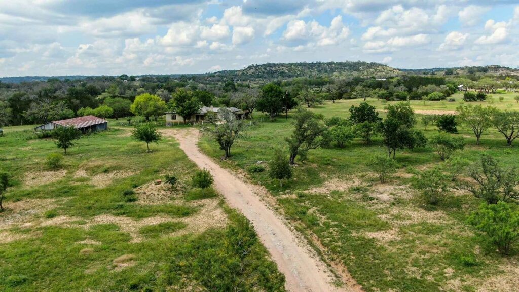 47-acres White Oak Road Fredericksburg, TX 78624 - Photo 4 of 37 a view of a street with a yard