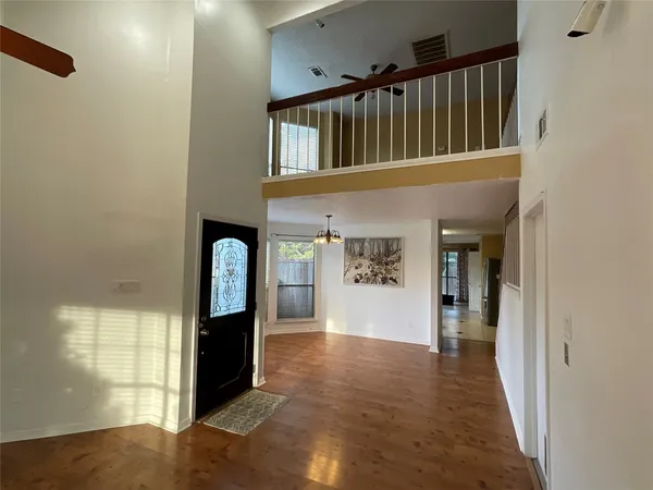 a view of hallway with stairs