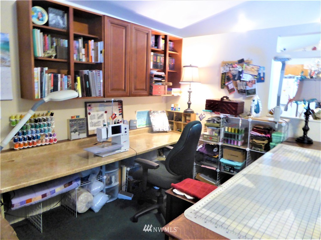 8209 177th Lane Southwest Rochester, WA 98579 - Photo 11 of 39 a view of a workspace with furniture