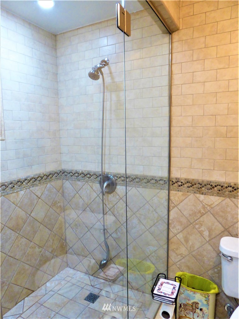 8209 177th Lane Southwest Rochester, WA 98579 - Photo 15 of 39 a bathroom with a shower