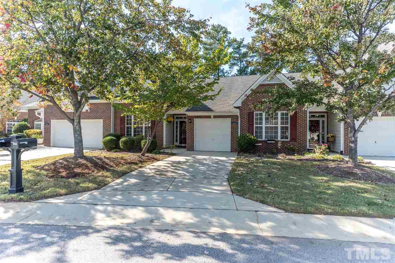 10423 Dapping Drive Raleigh, NC 27614 - Photo 1 of 25 a view of a house with a yard and large tree