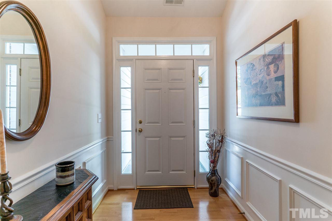10423 Dapping Drive Raleigh, NC 27614 - Photo 3 of 25 a view of a entryway door with wooden floor