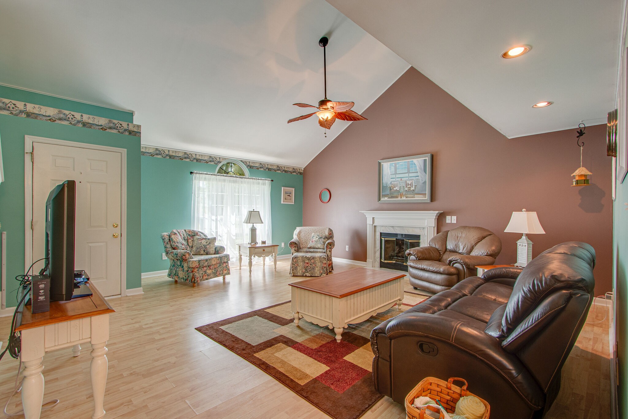 3624 Rutherford Drive Spring Hill, TN 37174 - Photo 6 of 33 a living room with furniture gym equipment and a flat screen tv