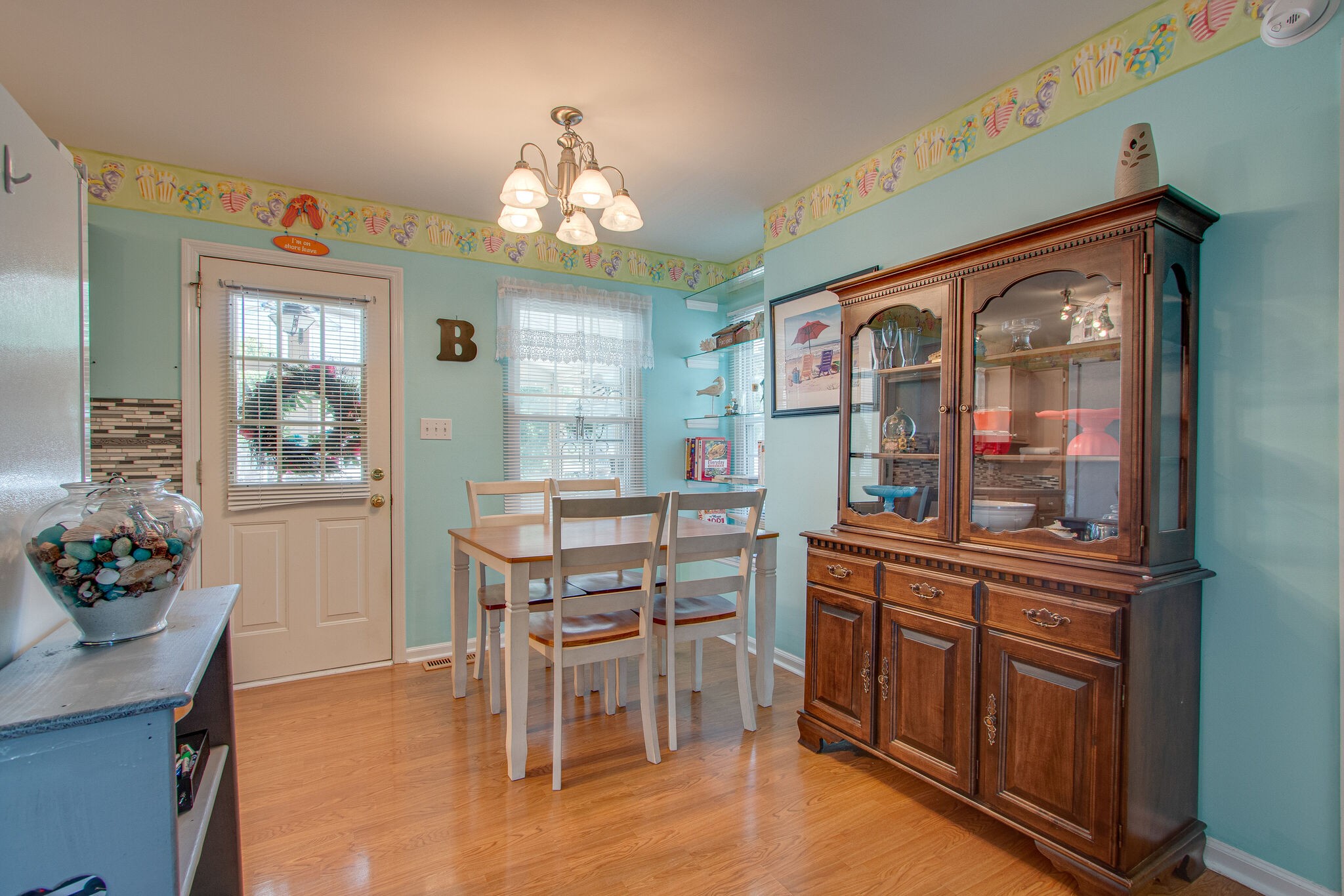 3624 Rutherford Drive Spring Hill, TN 37174 - Photo 9 of 33 a view of a dining room with furniture window and wooden floor