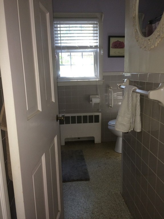 162 Allen Street Springfield, MA 01108 - Photo 15 of 19 a bathroom with a sink a toilet and a shower