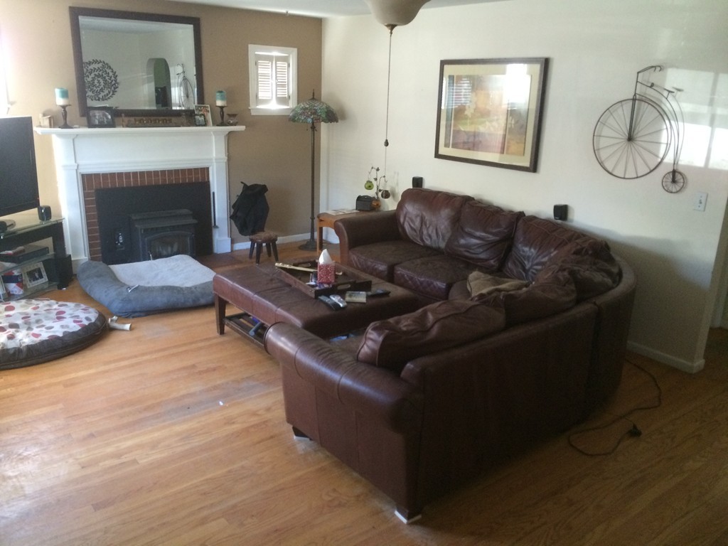 162 Allen Street Springfield, MA 01108 - Photo 3 of 19 a living room with furniture and a fireplace