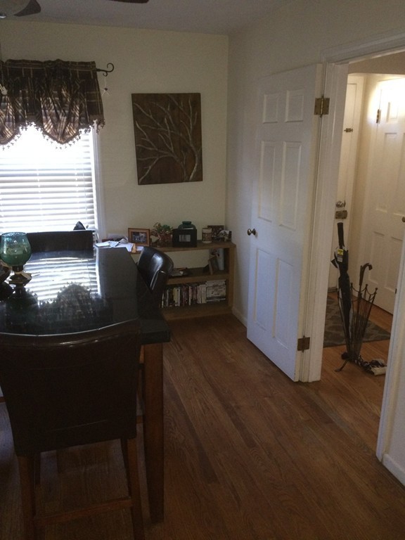 162 Allen Street Springfield, MA 01108 - Photo 8 of 19 a room with furniture and window