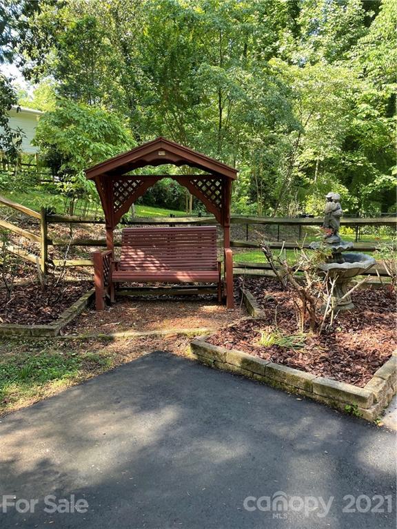 550 Neel Road Salisbury, NC 28147 - Photo 3 of 22 a view of a wooden deck with a yard