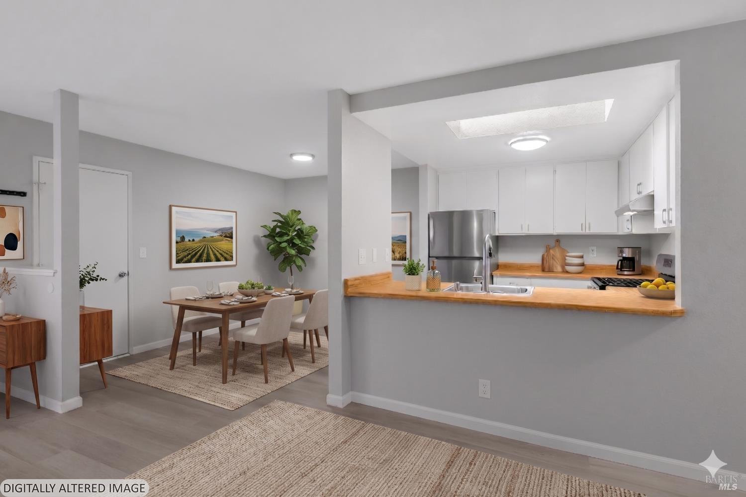 735 Blair Place Santa Rosa, CA 95401 - Photo 2 of 16 a kitchen with stainless steel appliances kitchen island granite countertop a sink and cabinets