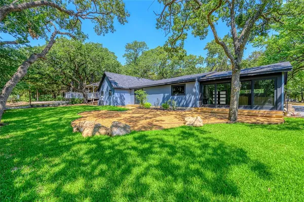 a house view with a garden space