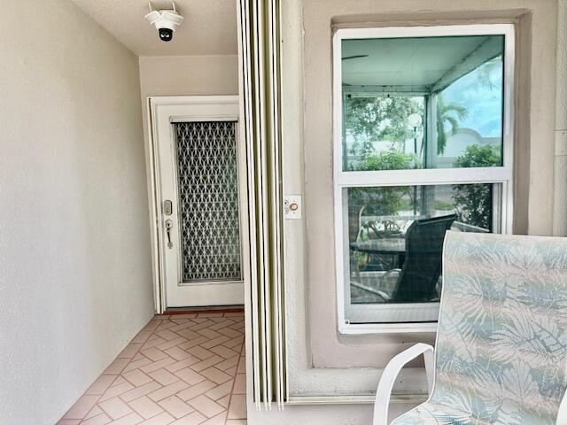 18730 Stewart Circle, Unit 5 Boca Raton, FL 33496 - Photo 2 of 24 Front Patio