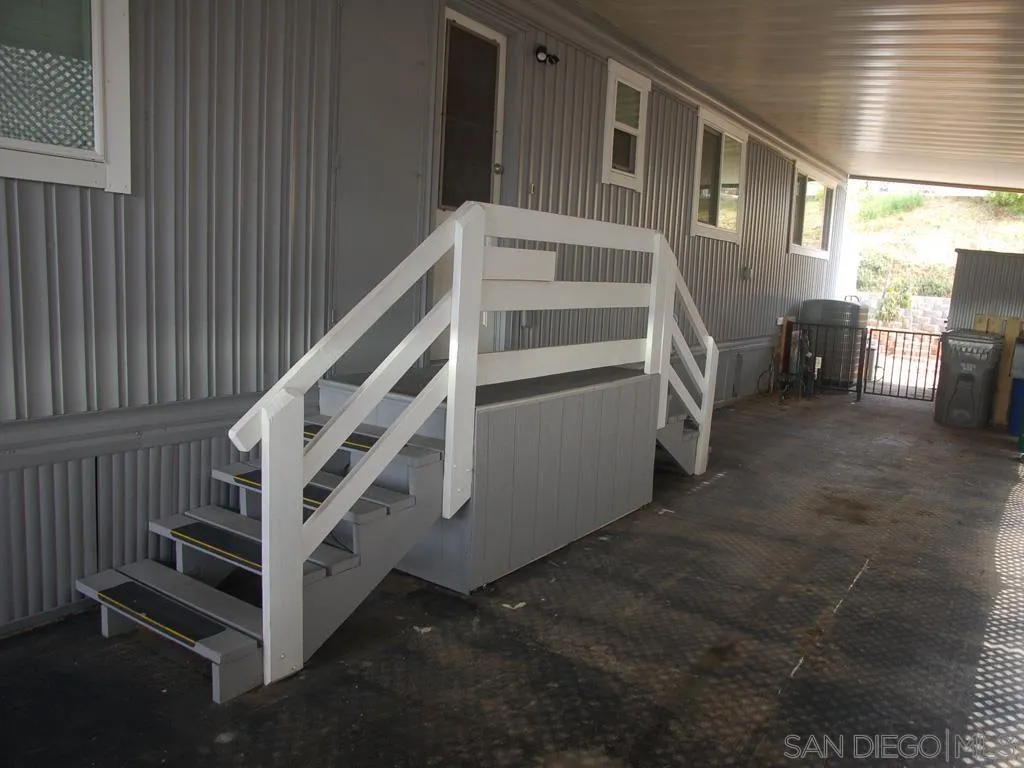 13300 East Los Coches Road East, Unit 68 El Cajon, CA 92021 - Photo 3 of 26 a view of entryway and hall with wooden floor