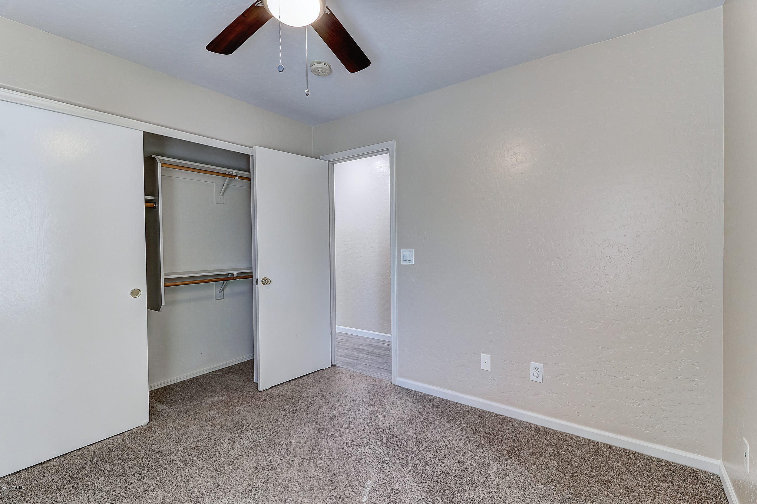 14726 West Calavar Road Surprise, AZ 85379 - Photo 16 of 24 a view of an empty room