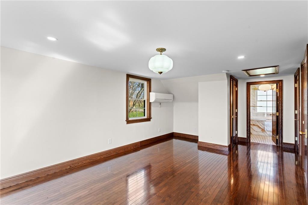 351 Engle Road Industry, PA 15052 - Photo 20 of 50 The mini-split in the primary bedroom works so efficiently and well that it heats and cools both upstairs bedrooms and the primary bath perfectly.
