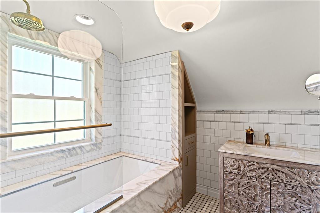 351 Engle Road Industry, PA 15052 - Photo 22 of 50 a bathroom with a bathtub and sink