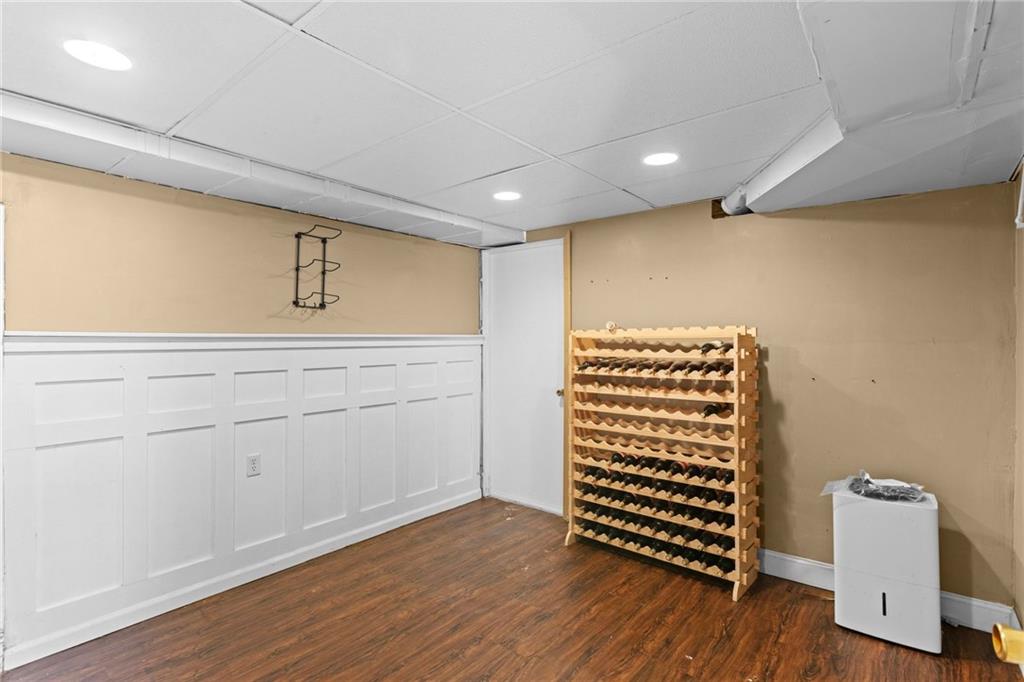 351 Engle Road Industry, PA 15052 - Photo 41 of 50 Previously used as a "wine room", this bonus room in the basement is flanked by storage space and the downstairs den.