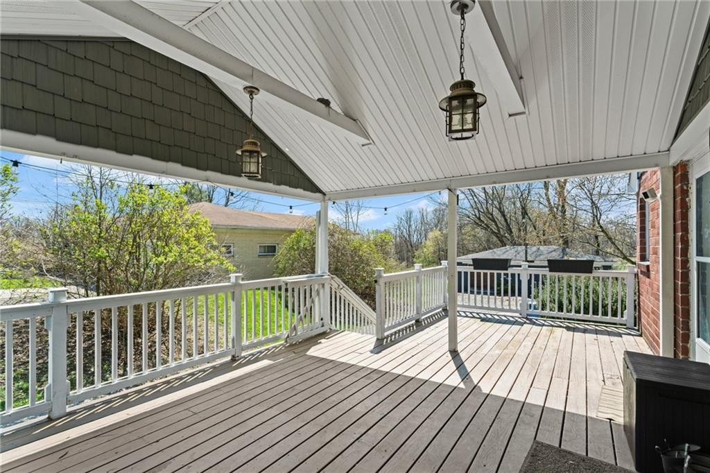 351 Engle Road Industry, PA 15052 - Photo 47 of 50 Here you have both a covered area to enjoy the outdoors without worries about the weather and a lovely uncovered area to enjoy the sun.