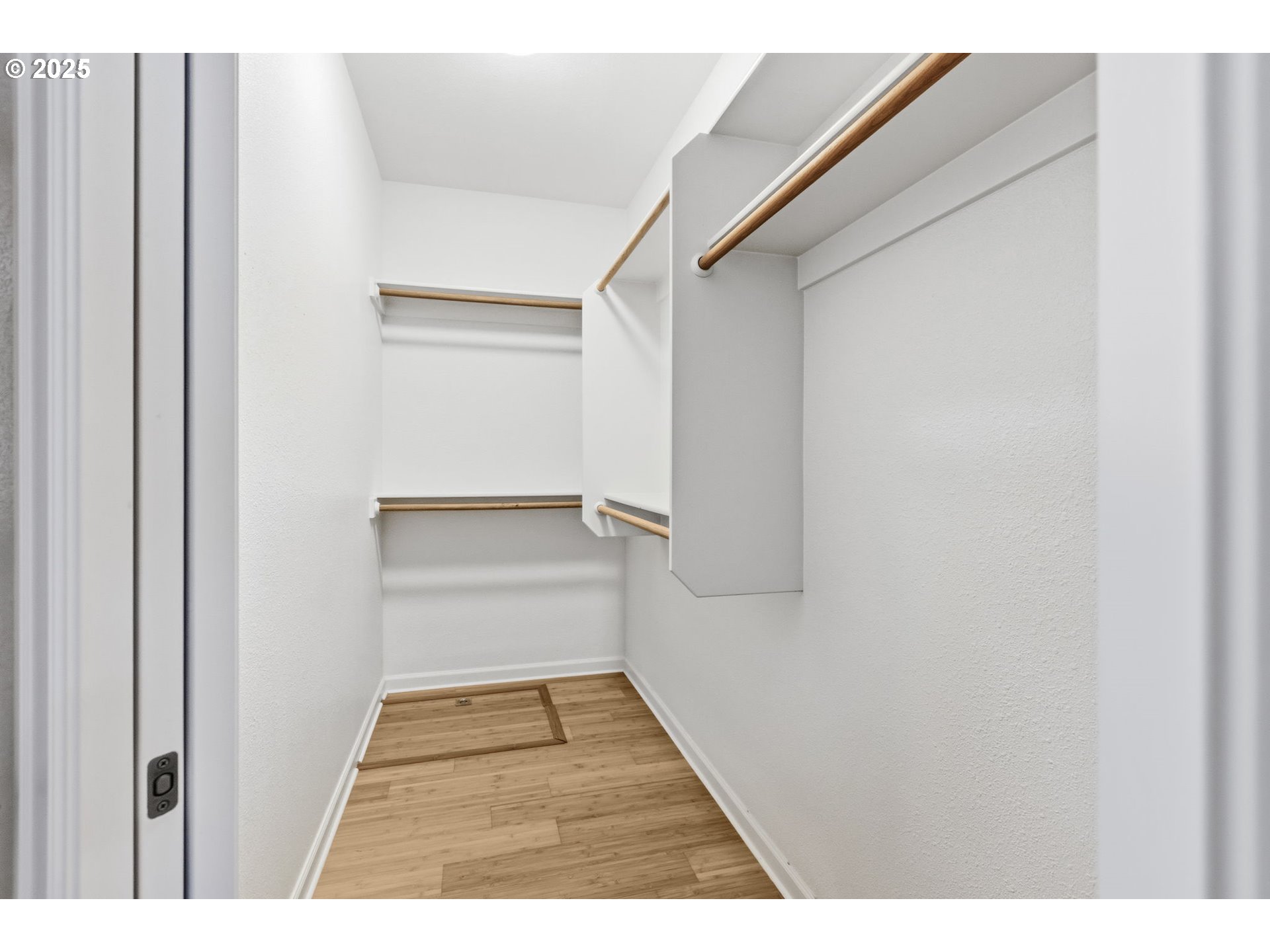 4879 Northeast Granite Avenue Albany, OR 97321 - Photo 17 of 47 a view of walk in closet with empty racks