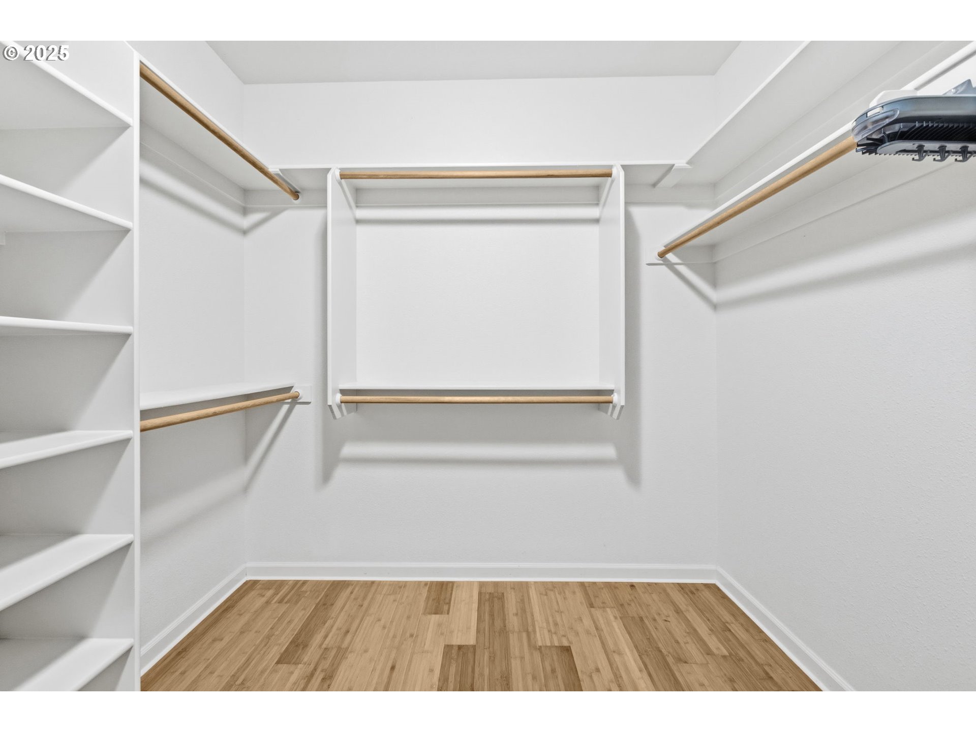 4879 Northeast Granite Avenue Albany, OR 97321 - Photo 19 of 47 a view of walk in closet with empty racks