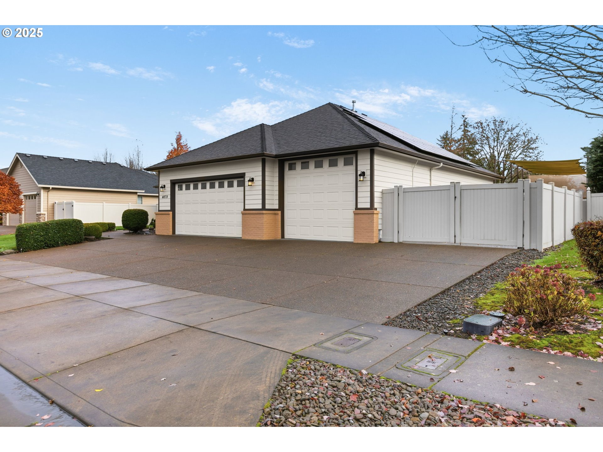 4879 Northeast Granite Avenue Albany, OR 97321 - Photo 22 of 47 a view of a house with a yard