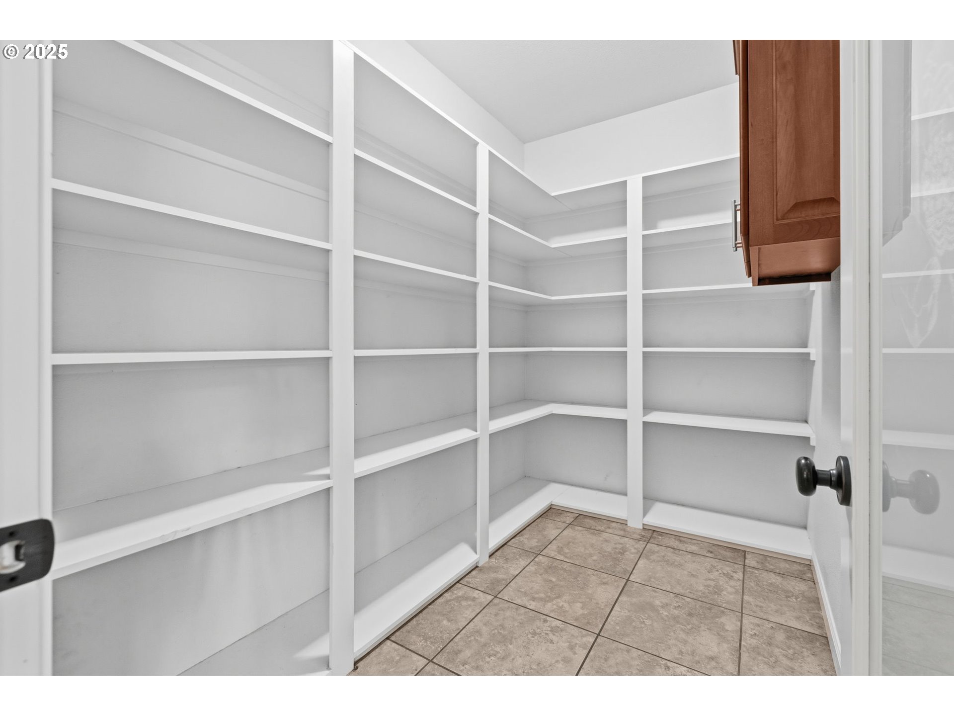 4879 Northeast Granite Avenue Albany, OR 97321 - Photo 30 of 47 a view of an empty room with empty racks