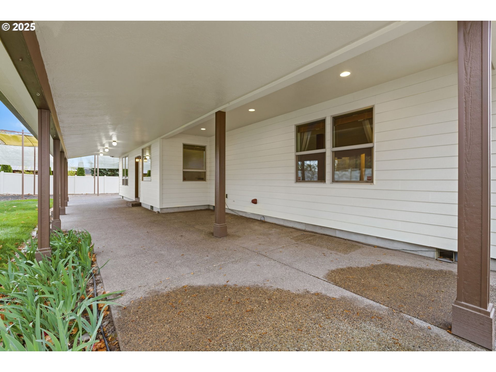 4879 Northeast Granite Avenue Albany, OR 97321 - Photo 45 of 47 a view of a house with a backyard