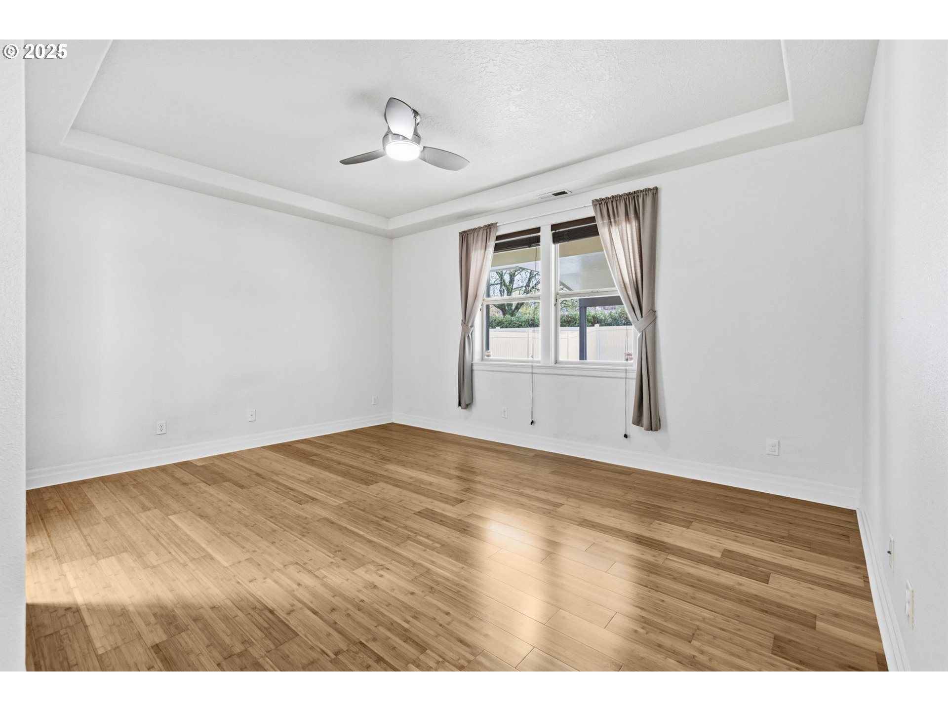 4879 Northeast Granite Avenue Albany, OR 97321 - Photo 8 of 47 a view of an empty room with a window