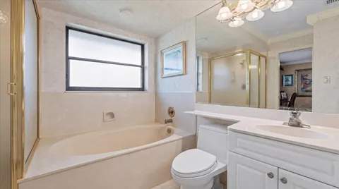 a bathroom with a sink a toilet and a bathtub