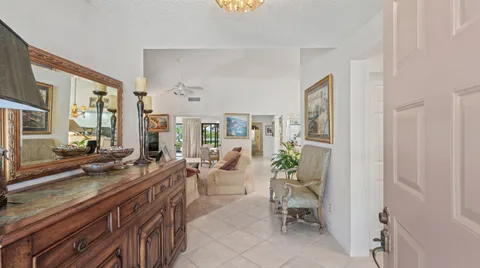 a view of a living room and dining room