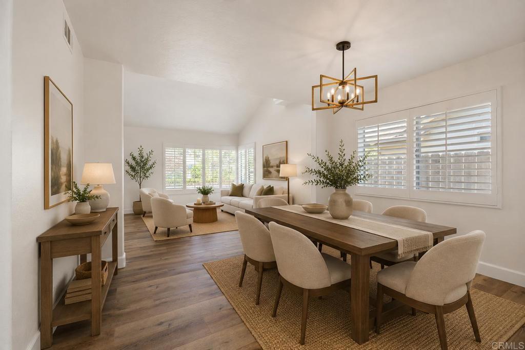 4595 Blackwell Road Oceanside, CA 92056 - Photo 10 of 47 a view of a dining room with furniture window and wooden floor