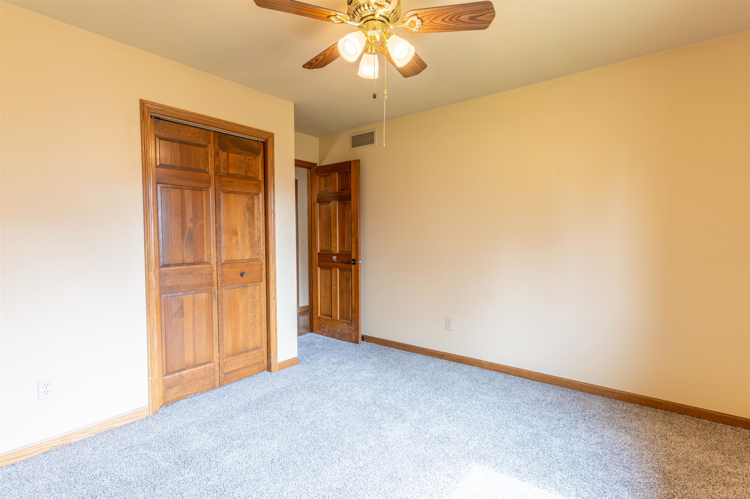 151 North Fox Run Lane Byron, IL 61010 - Photo 21 of 37 an empty room with chandelier fan