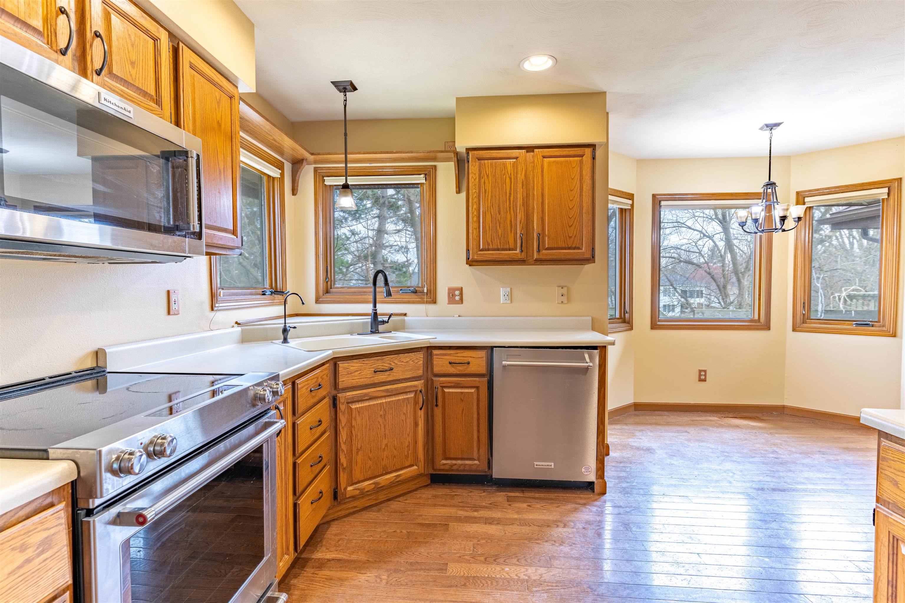 151 North Fox Run Lane Byron, IL 61010 - Photo 8 of 37 a kitchen with stainless steel appliances granite countertop a sink stove and refrigerator