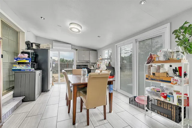 a bathroom with a sink vanity and toilet