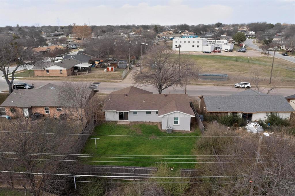 3442 Tioga Street Dallas, TX 75241 - Photo 27 of 28 an aerial view of a house with a yard