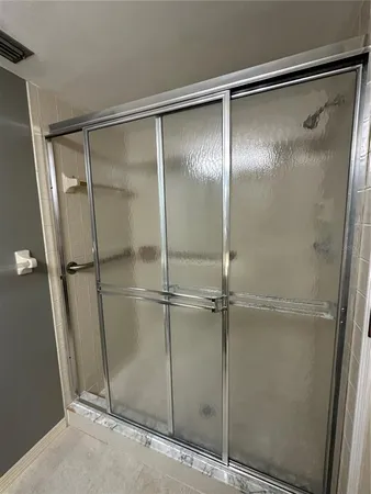 a view of a room with racks on the wall