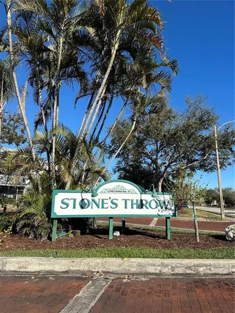 a view of a street with a balcony