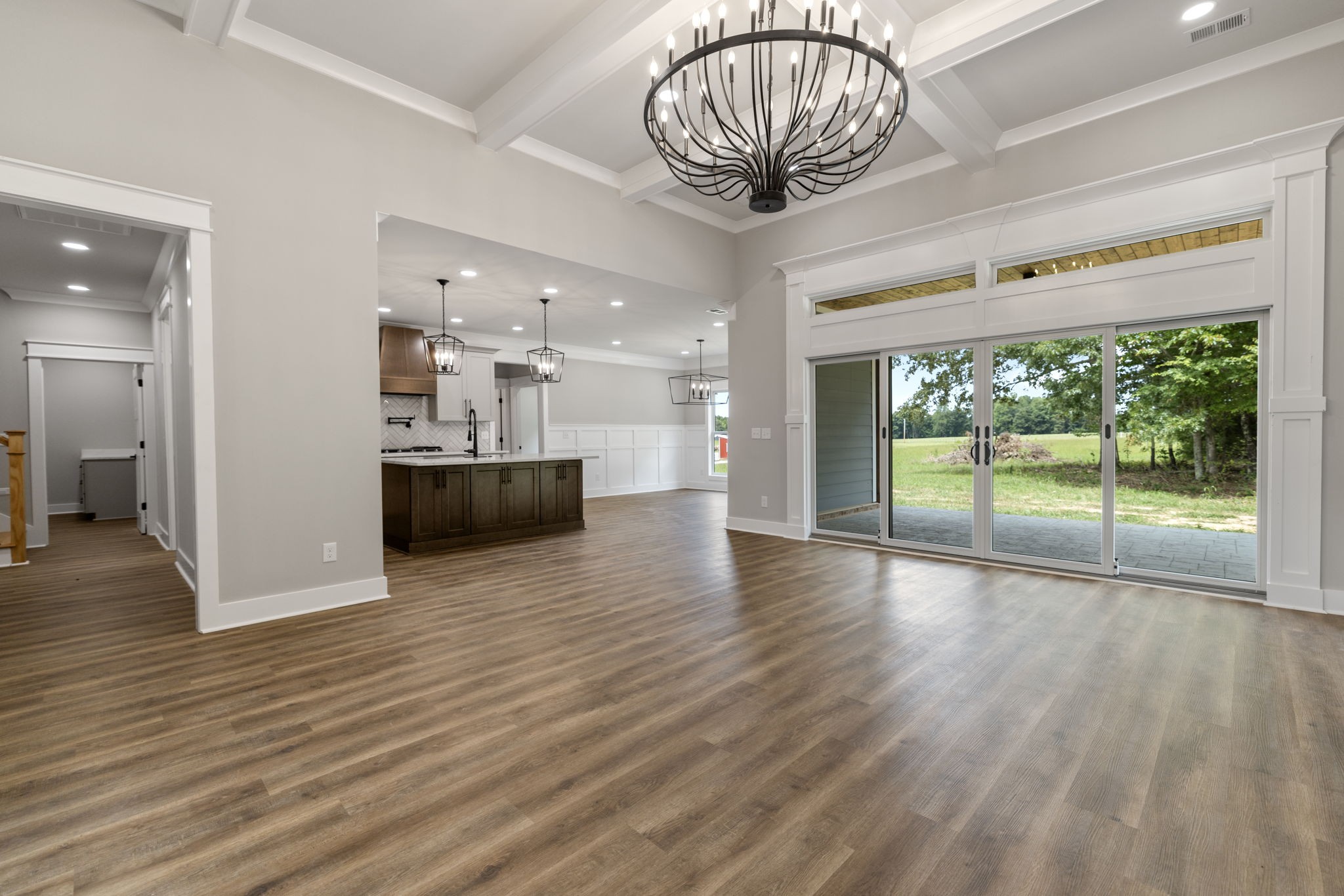 887 Ovoca Lake Road Tullahoma, TN 37388 - Photo 16 of 58 a view of empty room with wooden floor and fireplace