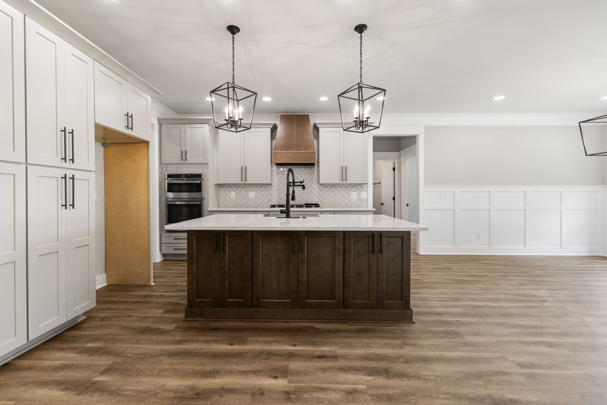 887 Ovoca Lake Road Tullahoma, TN 37388 - Photo 17 of 58 a kitchen with kitchen island granite countertop a sink cabinets and stainless steel appliances