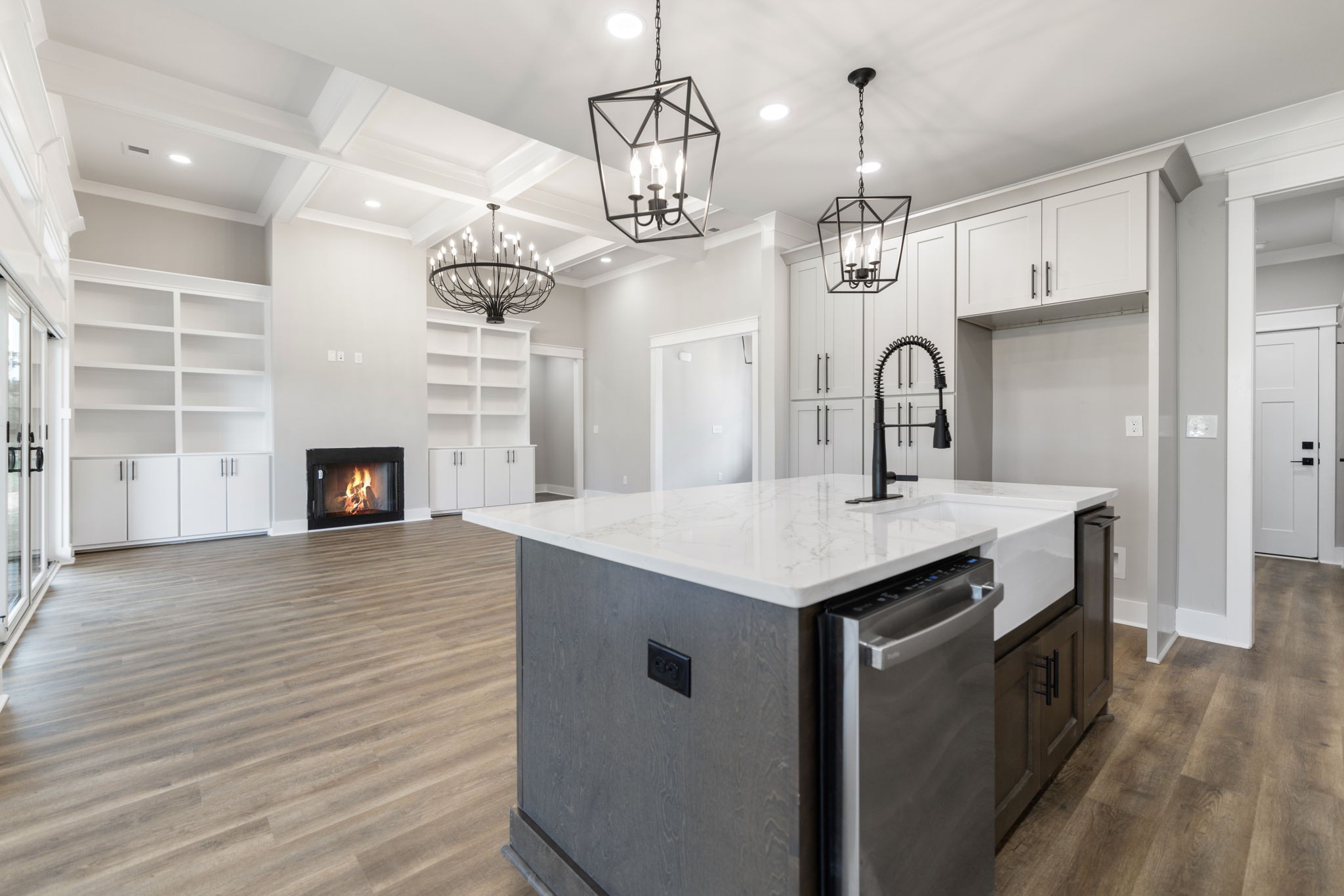 887 Ovoca Lake Road Tullahoma, TN 37388 - Photo 20 of 58 a kitchen with a sink and chandelier