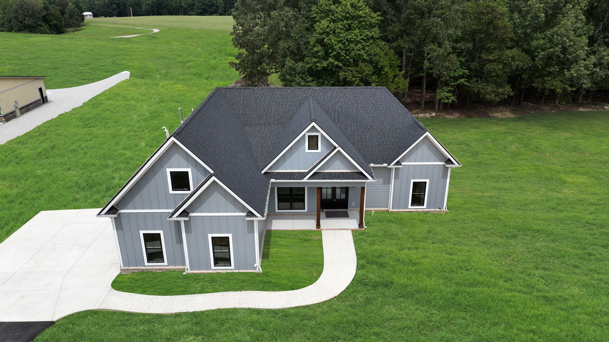 887 Ovoca Lake Road Tullahoma, TN 37388 - Photo 3 of 58 a aerial view of a house with a yard