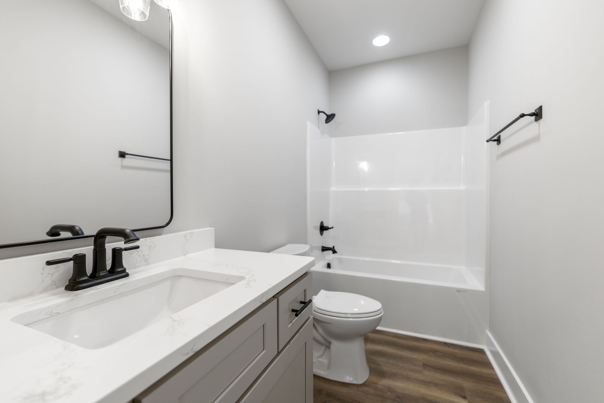 887 Ovoca Lake Road Tullahoma, TN 37388 - Photo 39 of 58 a bathroom with a sink toilet and shower