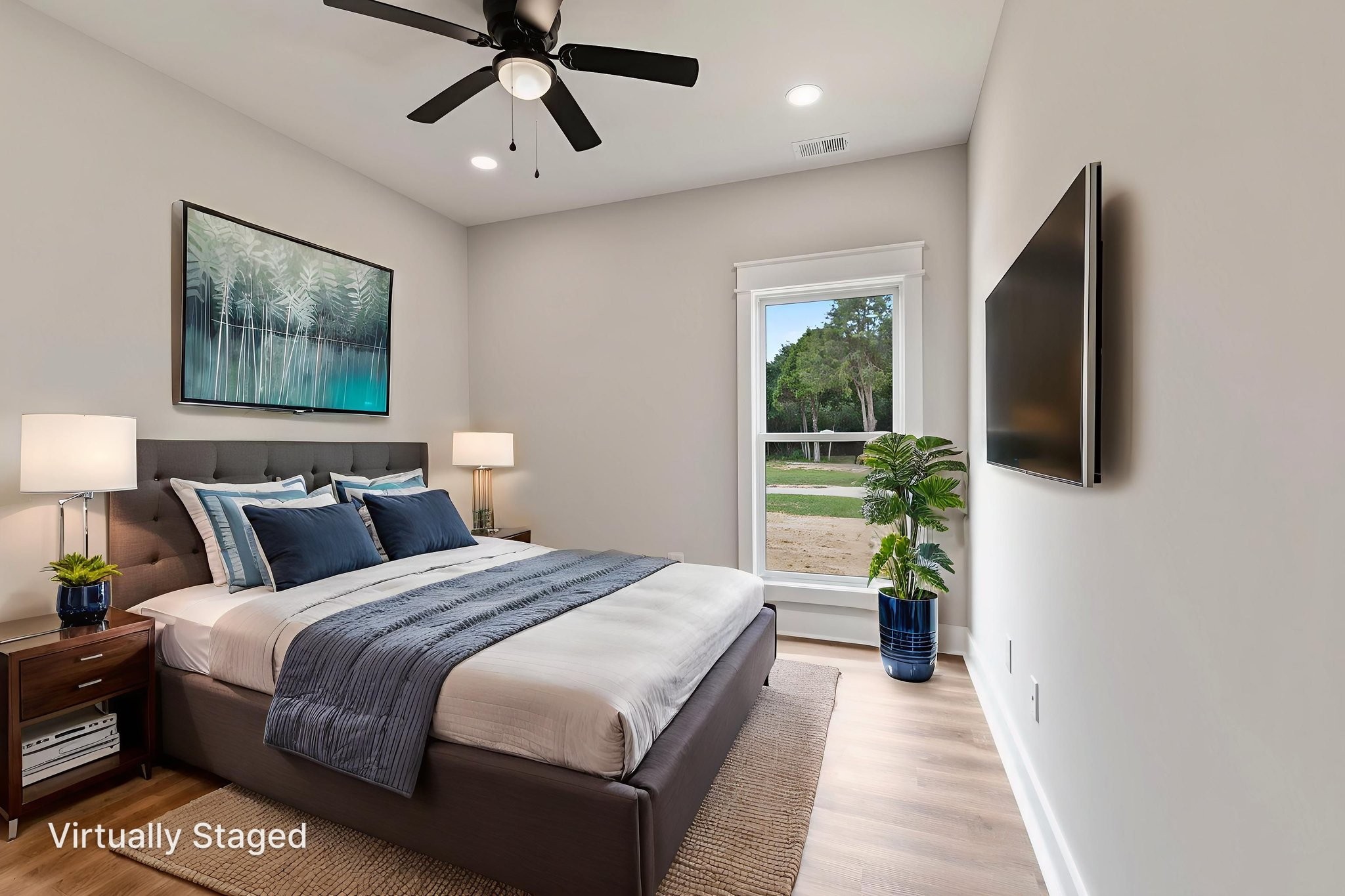 887 Ovoca Lake Road Tullahoma, TN 37388 - Photo 41 of 58 a bedroom with bed tv and window