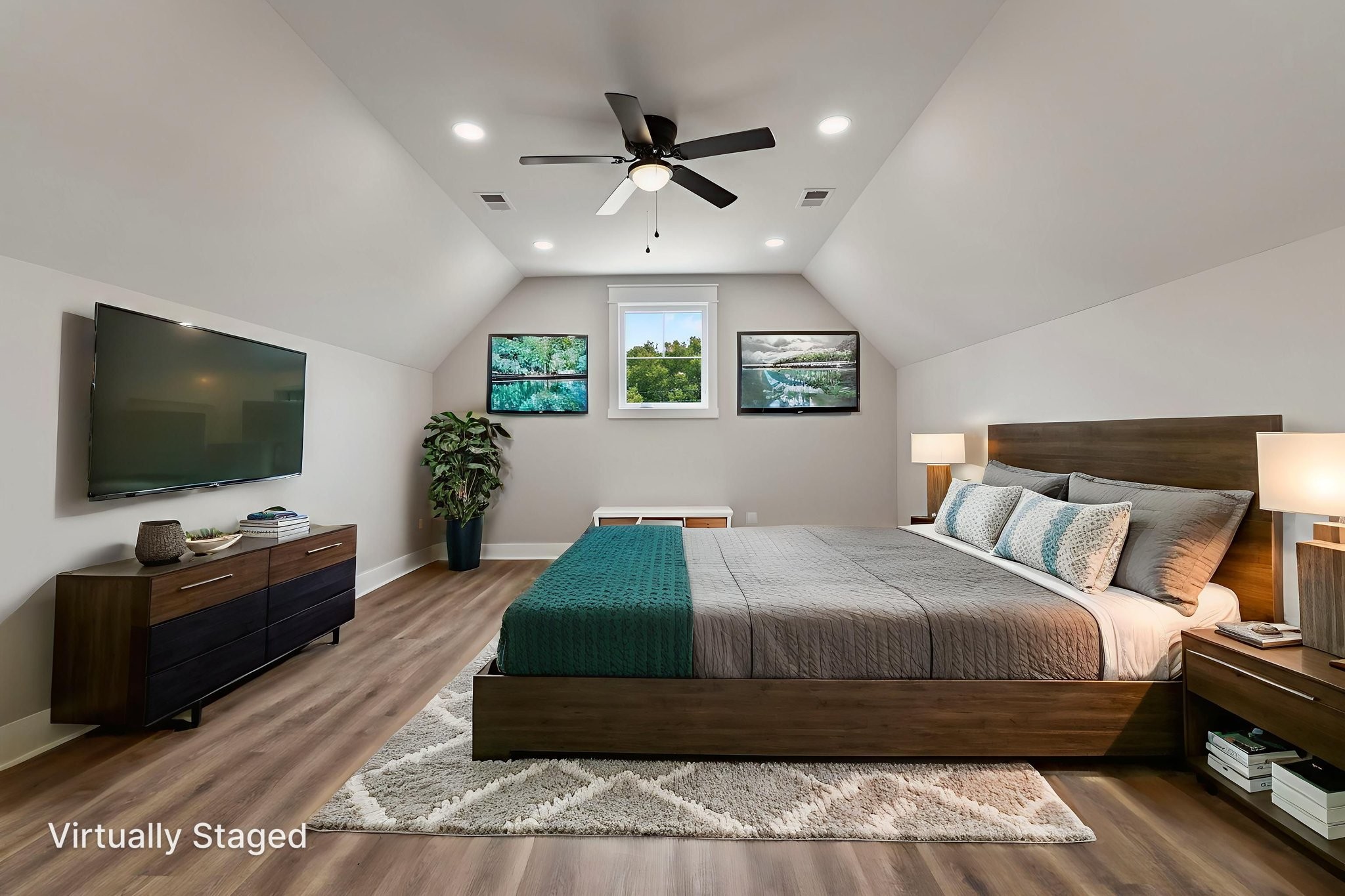 887 Ovoca Lake Road Tullahoma, TN 37388 - Photo 45 of 58 a bedroom with a bed and a flat screen tv