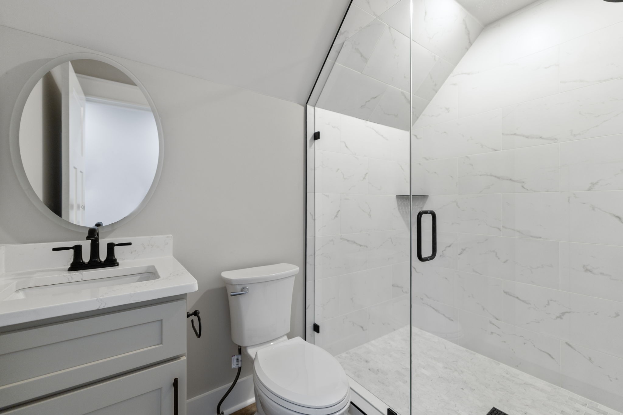 887 Ovoca Lake Road Tullahoma, TN 37388 - Photo 47 of 58 a bathroom with a sink toilet and shower