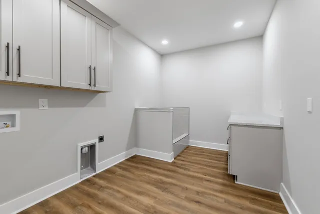 a aerial view of a house with a yard