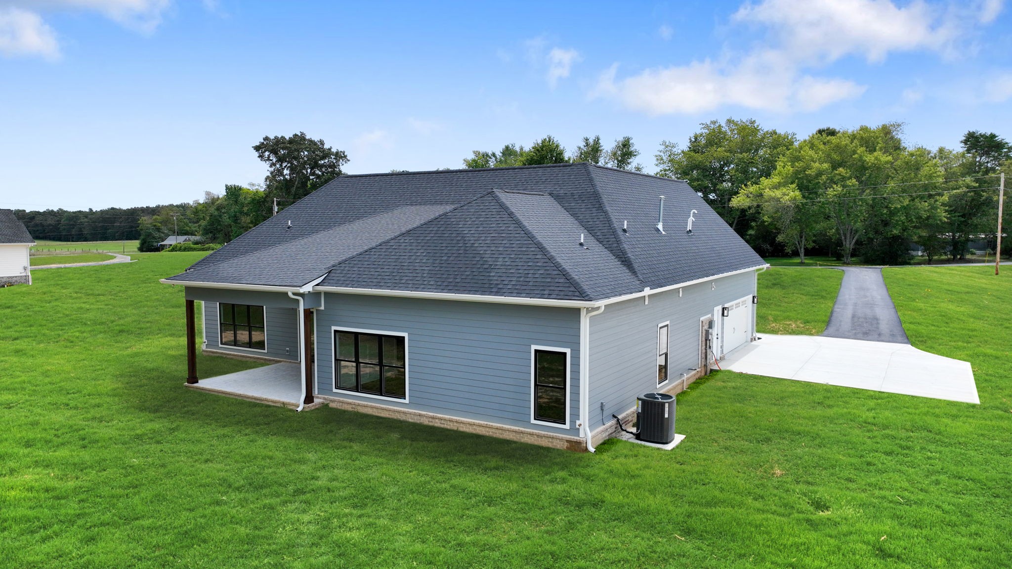 887 Ovoca Lake Road Tullahoma, TN 37388 - Photo 56 of 58 a aerial view of a house with a yard