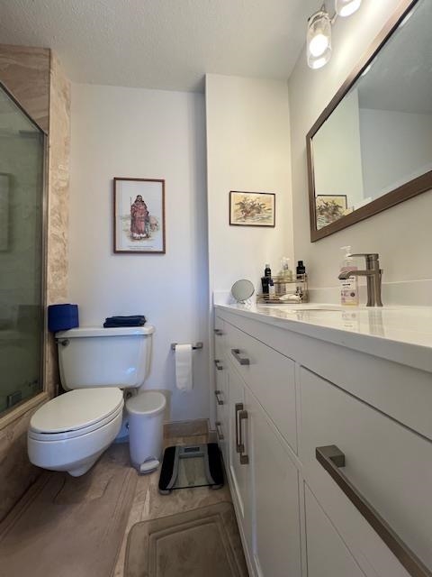 7002 Boulevard East, Unit 42D Guttenberg, NJ 07093 - Photo 19 of 42 a bathroom with a toilet sink and mirror