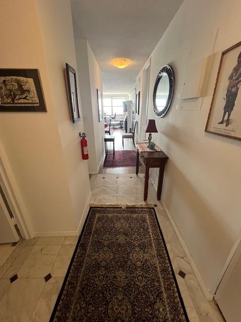 7002 Boulevard East, Unit 42D Guttenberg, NJ 07093 - Photo 3 of 42 a view of a hallway to a livingroom with furniture