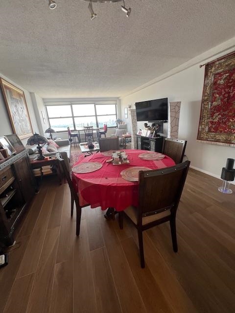 7002 Boulevard East, Unit 42D Guttenberg, NJ 07093 - Photo 9 of 42 a view of a dining room with furniture window and wooden floor