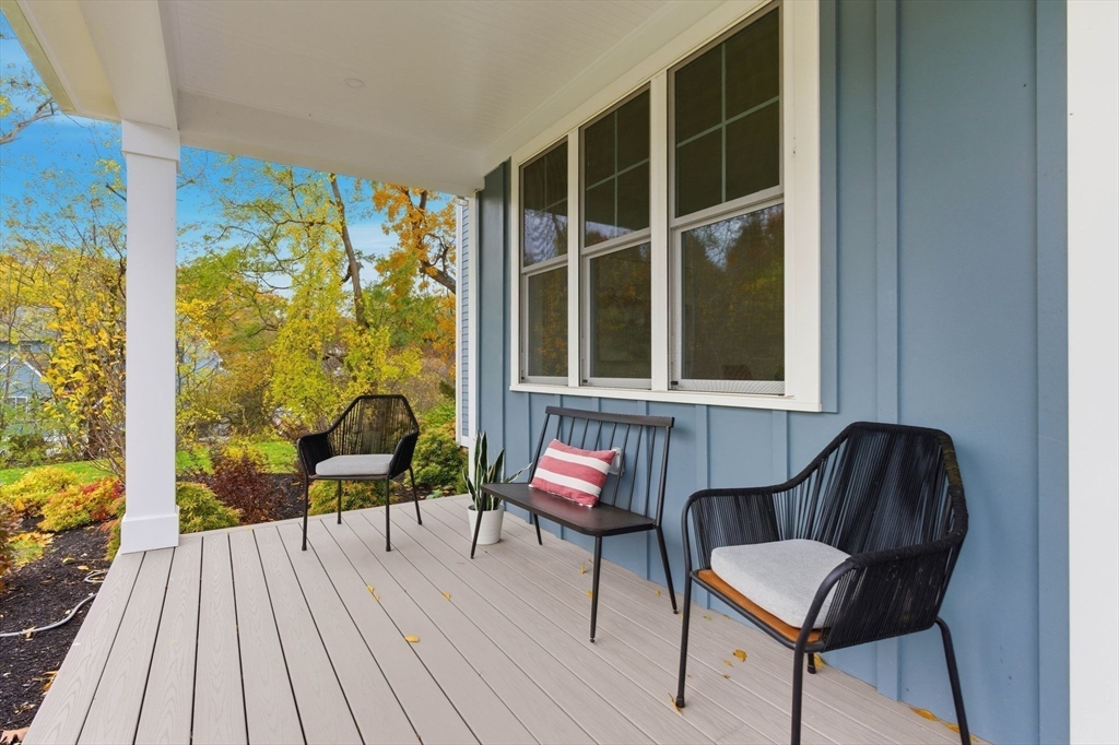 4 Chatham Lane Danvers, MA 01923 - Photo 5 of 40 a balcony with wooden floor and furniture